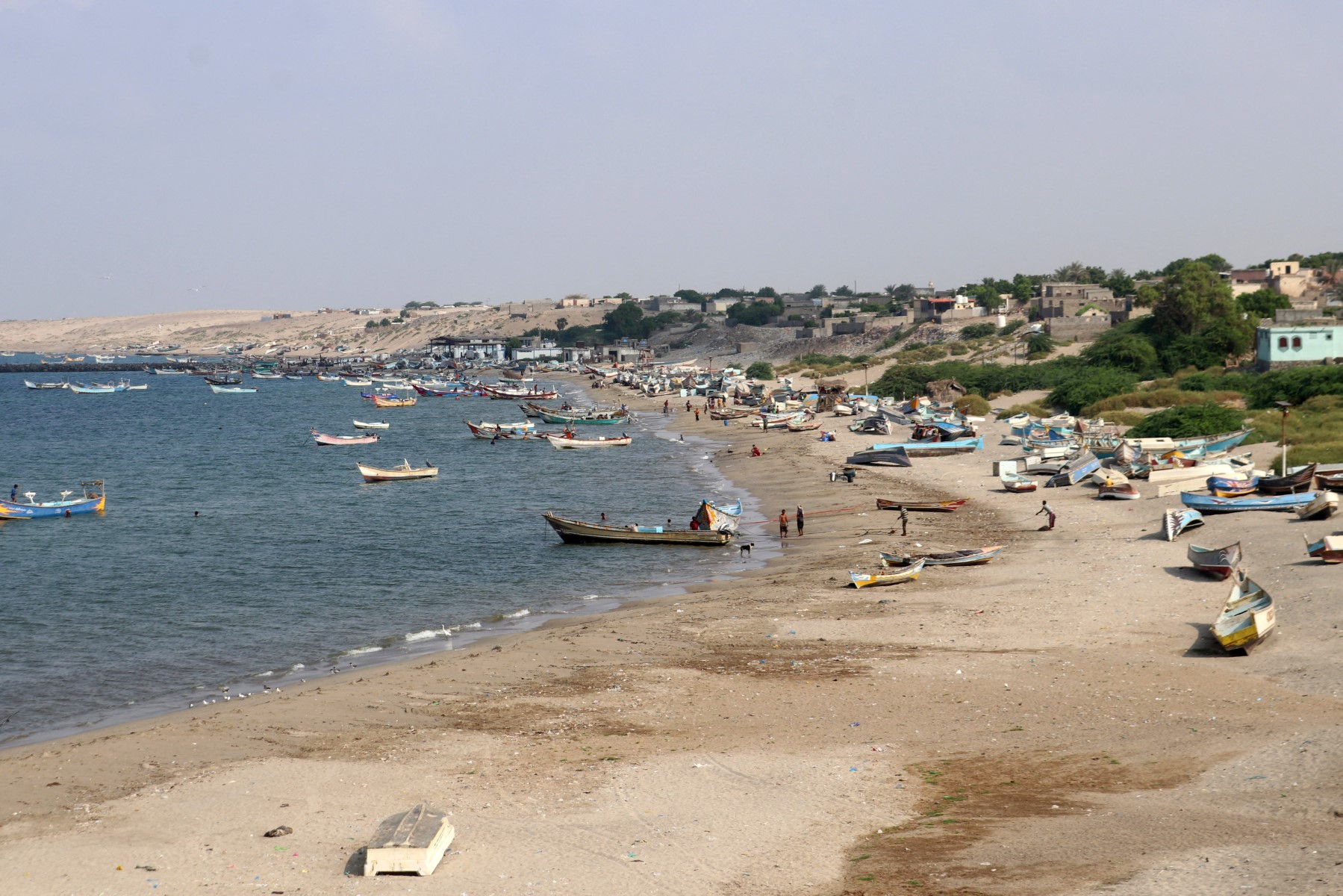 Fishermen's boats are scattered in a bay on the shore of the Red Sea in Yemen's Khokha district, south of Hodeida on October 20, 2024. (AFP)