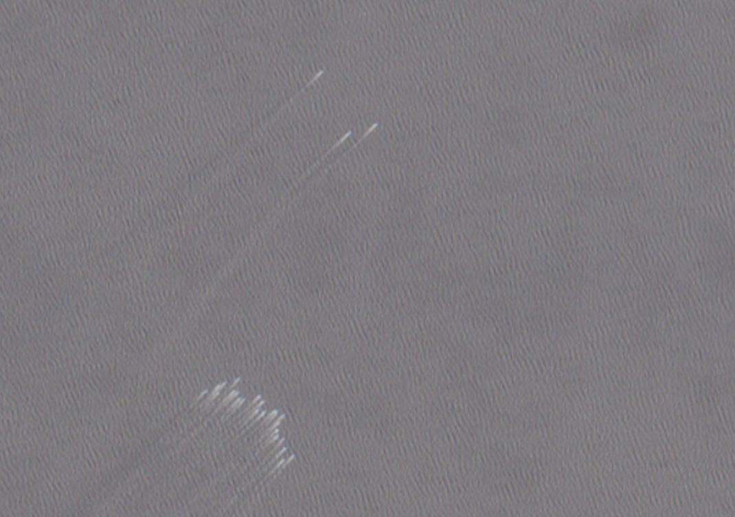 Satellite image shows small boats near the Strait of Hormuz on July 6. (REUTERS)