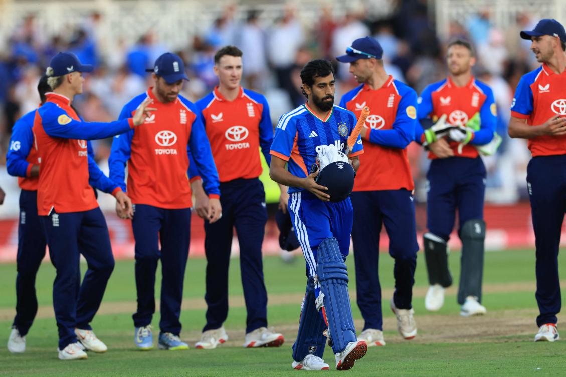 India’s Prince Yadav (C) walks off undefeated as England win the third Twenty20 (T20) international cricket match between England and India at Trent Bridge in Nottingham, on Jul. 7, 2026. (AFP)