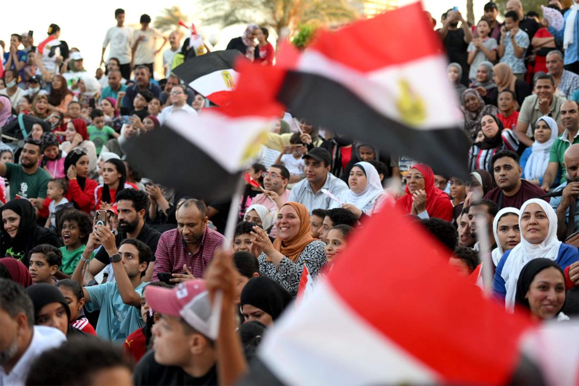 Egyptian football fans watch their national team’s 2026 World Cup Round of 16 match against Argentina on a large screen at a club park in Cairo’s Zamalek district on Jul. 7, 2026. (AFP)