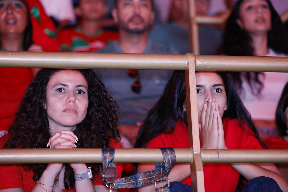 Morocco fans react as they watch their team’s World Cup quarter-final match against France in Rabat on July 9, 2026. (AFP)