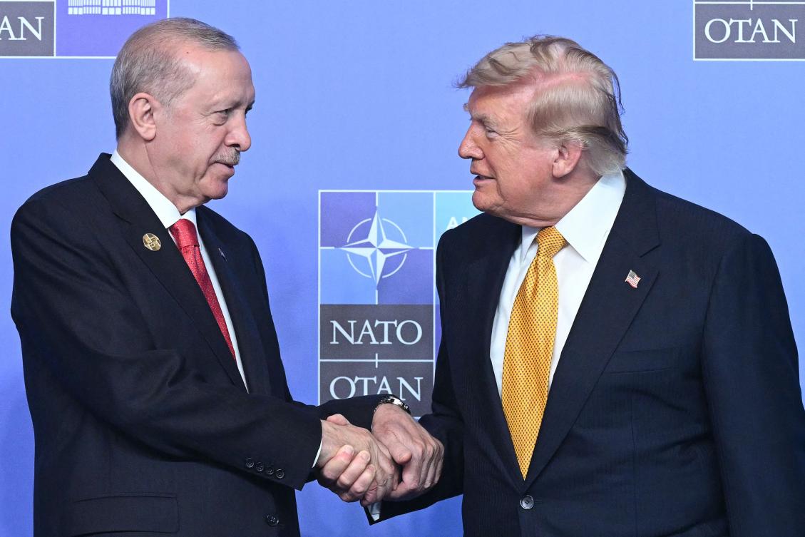 Turkiye’s President Recep Tayyip Erdogan shakes hands with President Donald Trump during the NATO Summit in Ankara on Wednesday. (AFP)