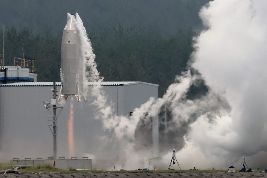 The Reusable Vehicle eXperiment, known as RV-X, is seen in a test launch at the Noshiro Rocket Testing Center of the Japan Aerospace Exploration Agency in Noshiro, northern Japan. (AFP)