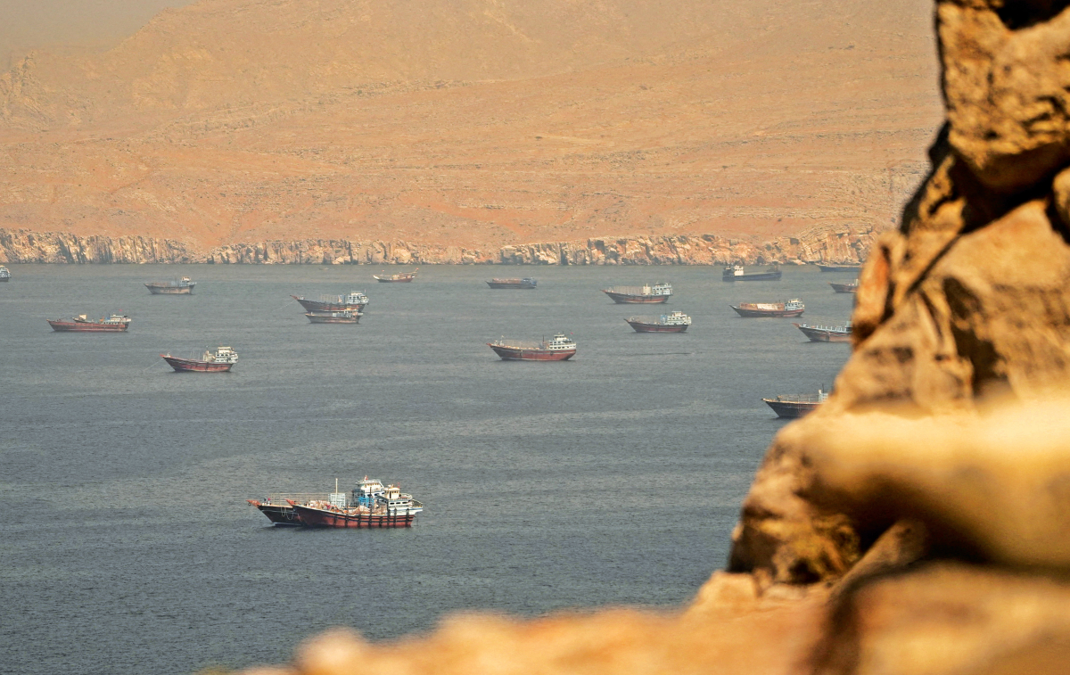 Vessels sail through the Strait of Hormuz, as seen from Musandam, Oman, June 18, 2026. (Reuters/File photo)