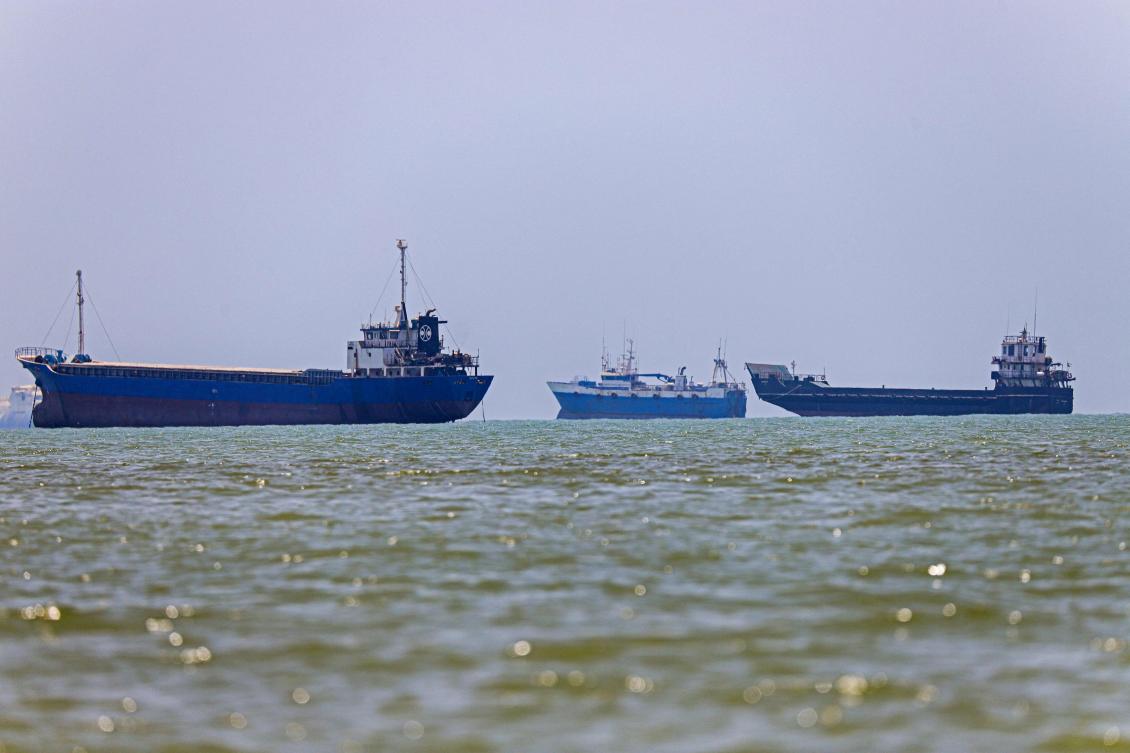 Tehran announced it was closing the Strait of Hormuz on July 12 and launched missiles and drones at its Gulf neighbours, in retaliation for new US strikes following an attack by Iranian forces on a merchant vessel that was abandoned in flames by its crew. (ISNA / AFP) /