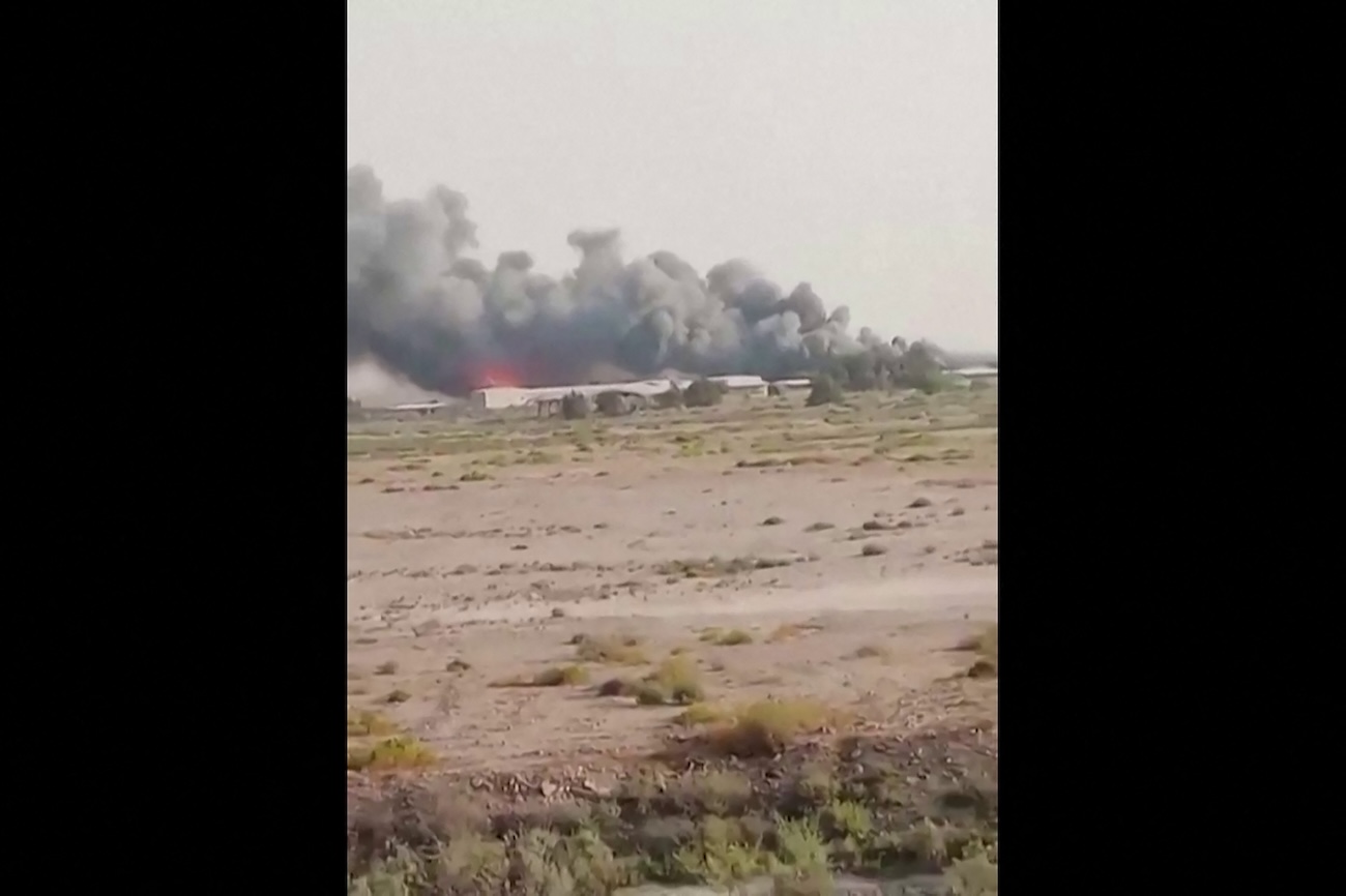 Video grab taken from UGC images posted on social media on July 12, 2026, shows heavy smoke billowing in Abdali, at Kuwait's northern border. (AFP)