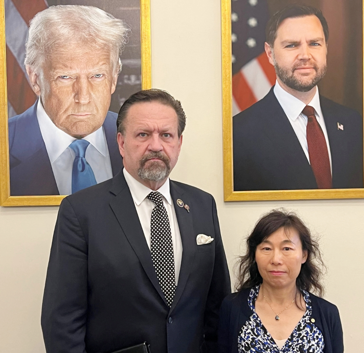 Dr. Yufang Rong, the wife of Dr. Youlin Chen, an American seismologist held for nearly two years by China, stands with Sebastian Gorka, deputy national security advisor to U.S. President Donald Trump, in this undated photograph provided on July 13, 2026. (REUTERS)