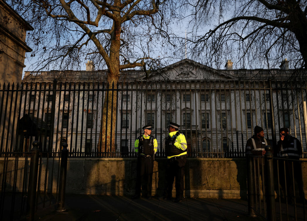 Police officers stand outside the Royal Mint Court, the proposed site of a new Chinese mega embassy at Royal Mint Court, in London, Jan. 17, 2026. (Reuters/File)