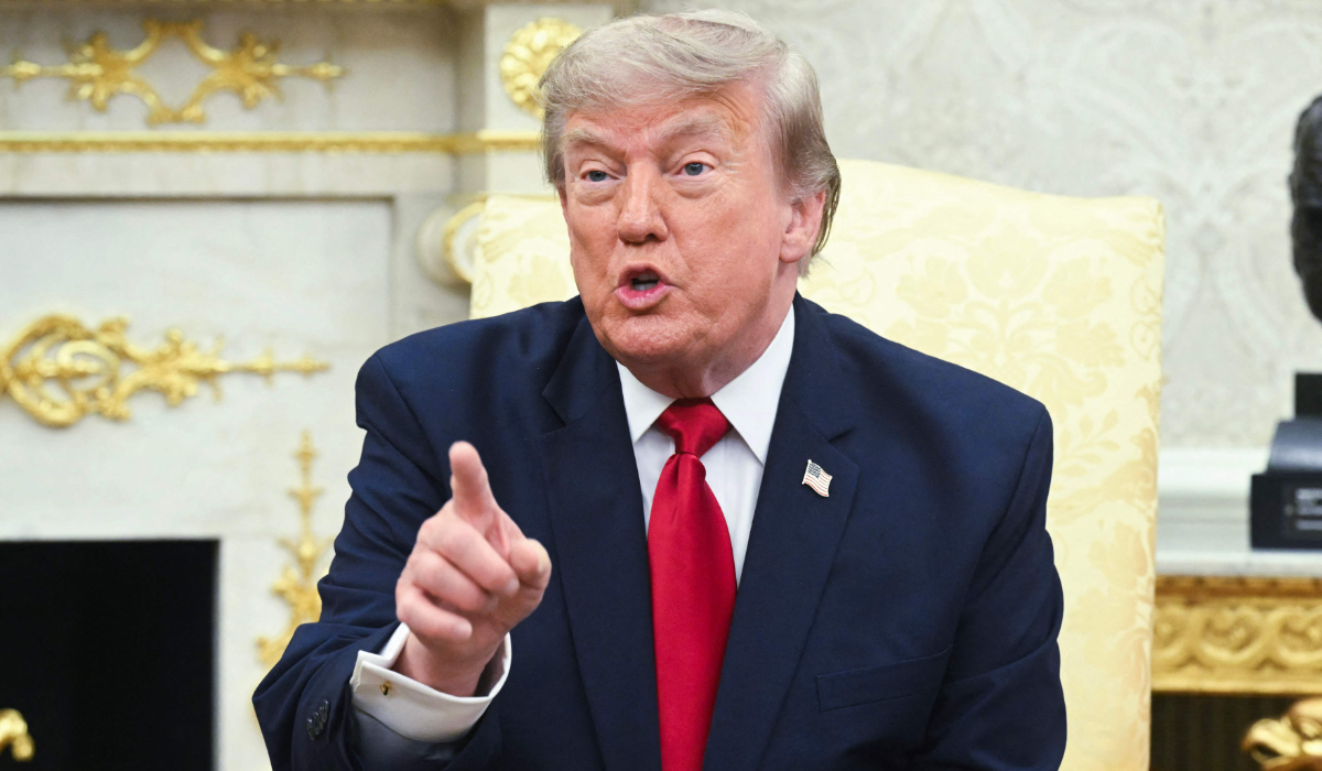 US President Donald Trump takes questions from reporters during a meeting with Prime Minister of Iraq Ali al-Zaidi in the Oval Office of the White House in Washington, DC, on July 14, 2026. (AFP)