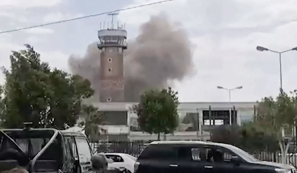 This screen grab taken from a video footage made available via AFPTV on July 13, 2026 shows smoke rising from the airport in Sanaa. (AFP/File Photo)