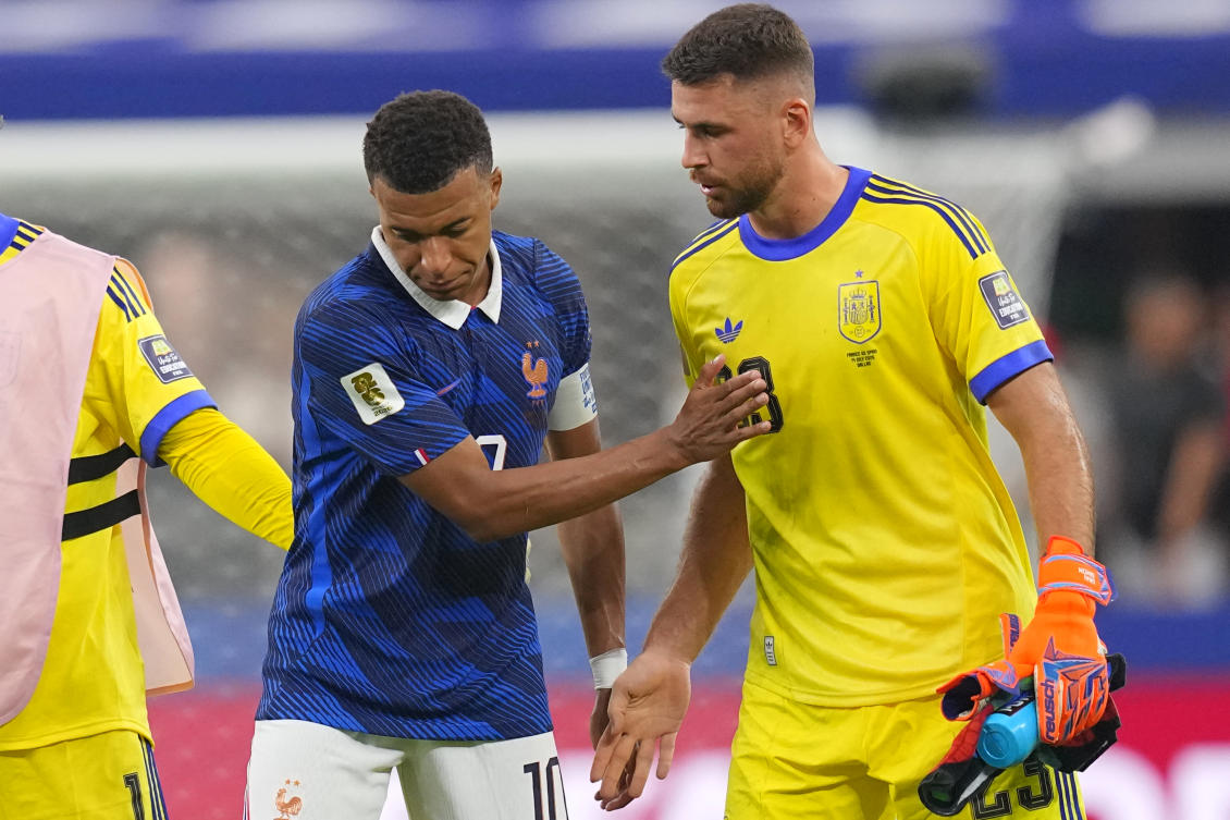 Spain goalkeeper Unai Simon greets France’s Kylian Mbappe after Spain defeated France in a World Cup semifinal soccer match in Arlington, Texas, Jul. 14, 2026. (AP)