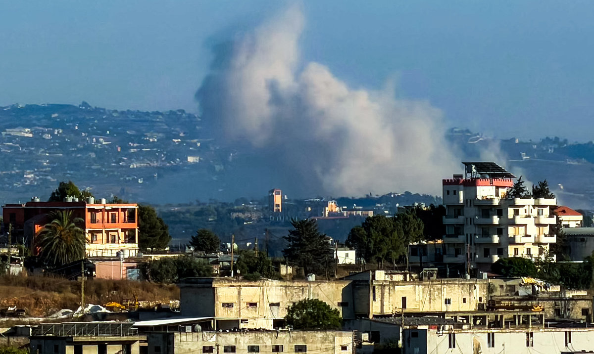 Smoke rises following Israeli controlled-explosions in the village of Deir Siryan as seen from Nabatieh in southern Lebanon on July 14, 2026. (AFP)