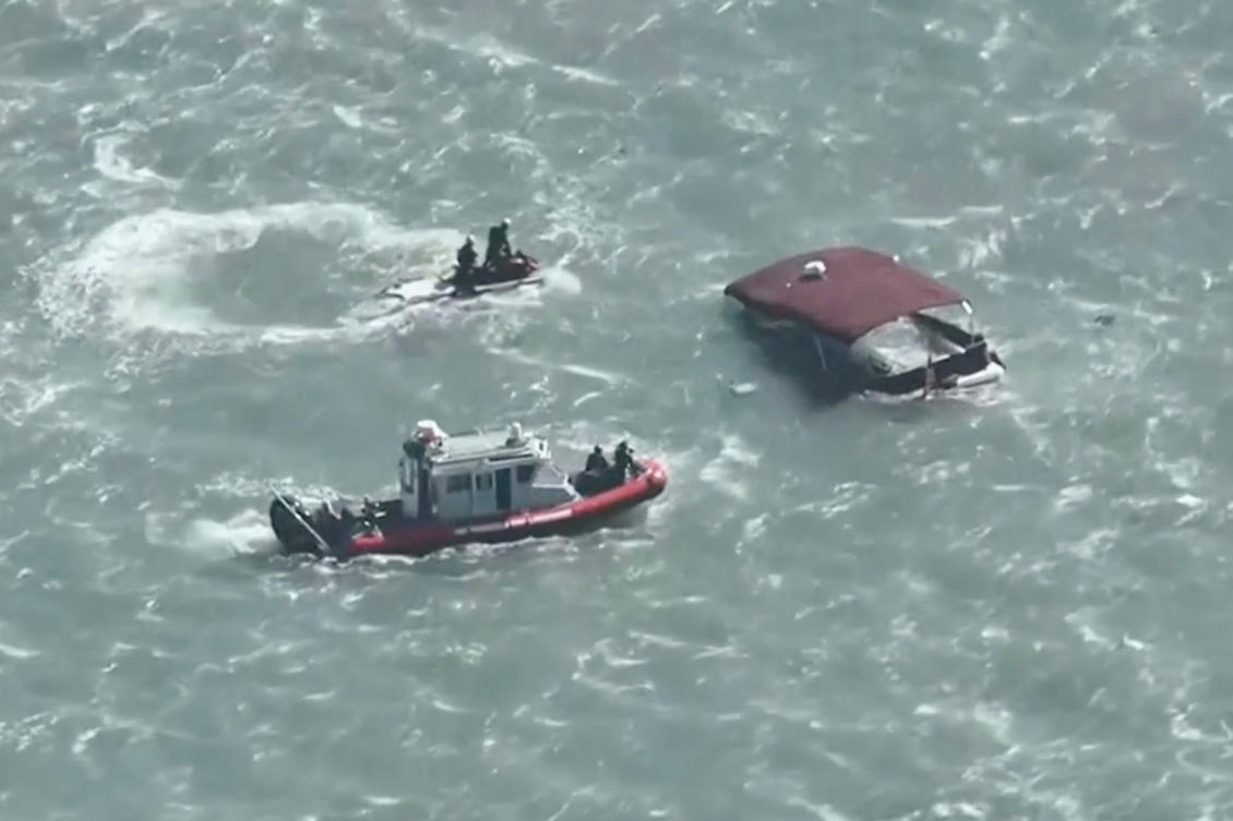 This image made from video provided by KGO-TV shows first responders reacting to a sinking boat on July 14, 2026, in the waters off of San Francisco. (KGO via AP)