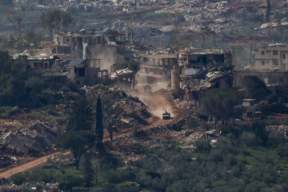 Above, an Israeli military vehicle drives past destroyed buildings in Lebanon on April 30, 2026. (Reuters)