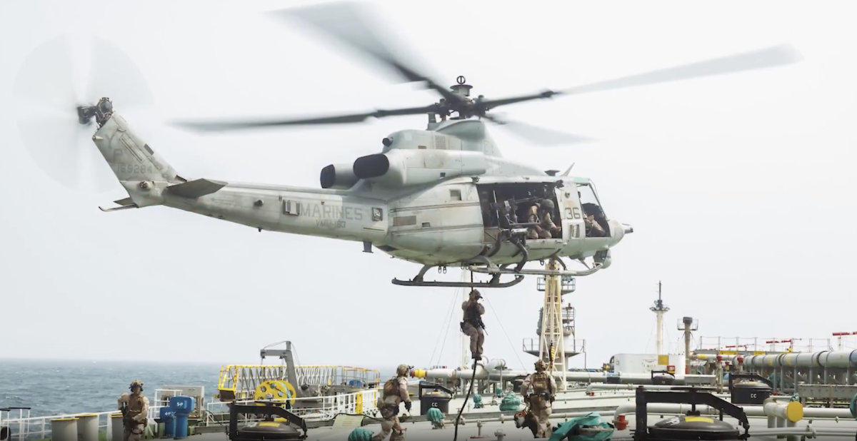 A US Marine chopper hovers over the oil tanker M/T Wen Yao as it unloads soldiers during a ship-boarding mission on July 16, 2026. (Screen grab from CENTCOM video)