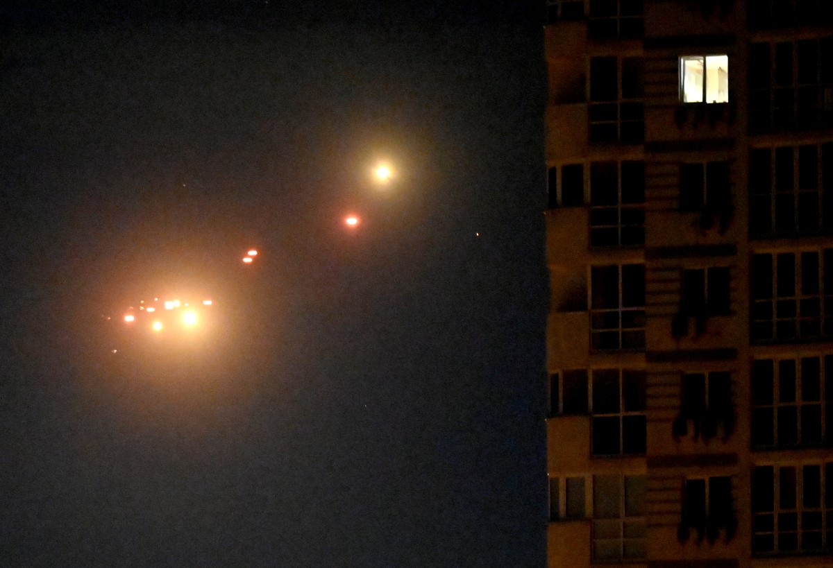 Ukrainian air defence firing at Russian drones above Kyiv during a Russian drone and missile strike on the Ukrainian capital. (AFP)