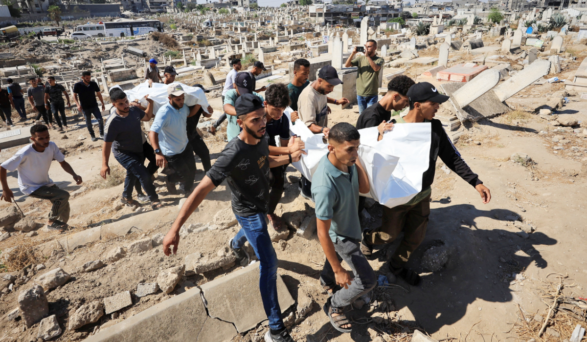 Mourners participate in the funeral of Palestinians, who, according to medics, were killed in an Israeli strike carried out late on Saturday, in Gaza City, July 19, 2026. (REUTERS)