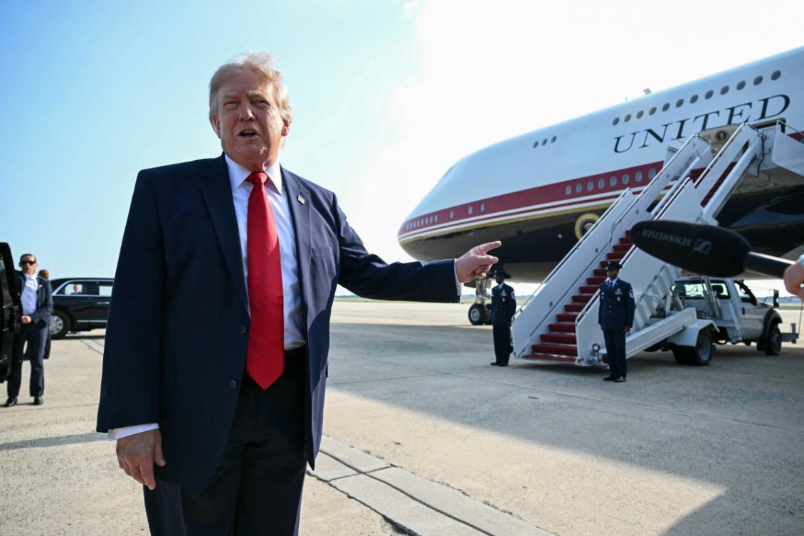 President Donald Trump speaks to the press before he boards Air Force One for his first flight aboard the Boeing 747-8 that Qatar gifted US to use for executive travel, at Joint Base Andrews, in Maryland, July 1, 2026. (AFP)