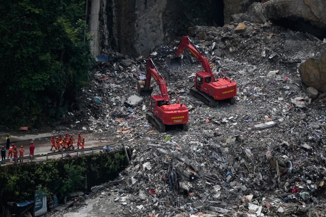 Rescuers work at the scene of a landslide in Pengshui County, southwestern China's Chongqing on Sunday, July 19, 2026. (AP)