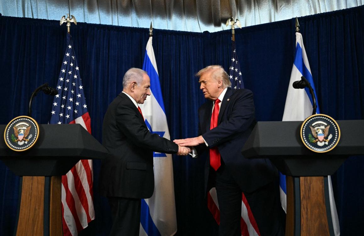 US President Donald Trump (R) and Israeli Prime Minister Benjamin Netanyahu shake hands as they arrive to speak to journalists during a joint press conference at Trump’s Mar-a-Lago residence in Palm Beach, Florida. (File/AFP)