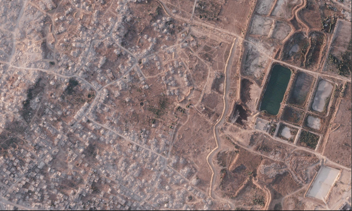 This satellite image from Planet Labs PBC shows a section of an earthen barrier being built by the Israeli military in the northern Gaza Strip, Jul. 8, 2026. (AP)