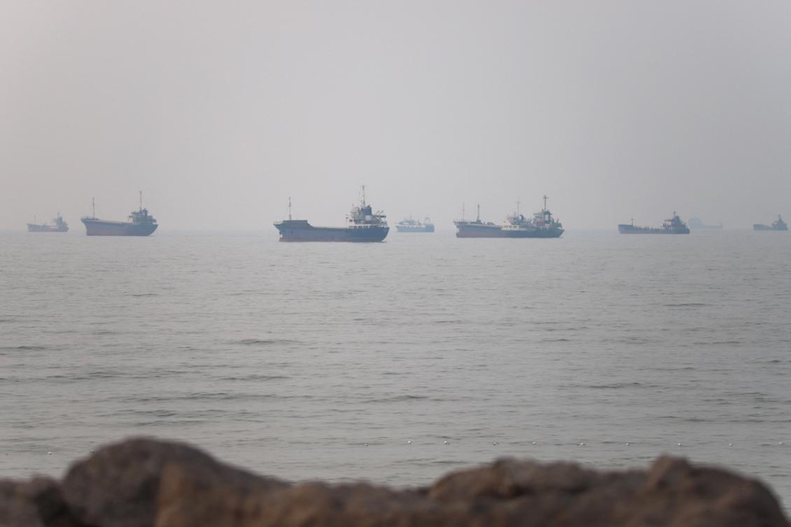 Above, vessels in the Strait of Hormuz near the beach of Bandar Abbas, Iran on June 30, 2026. (West Asia News Agency via Reuters)
