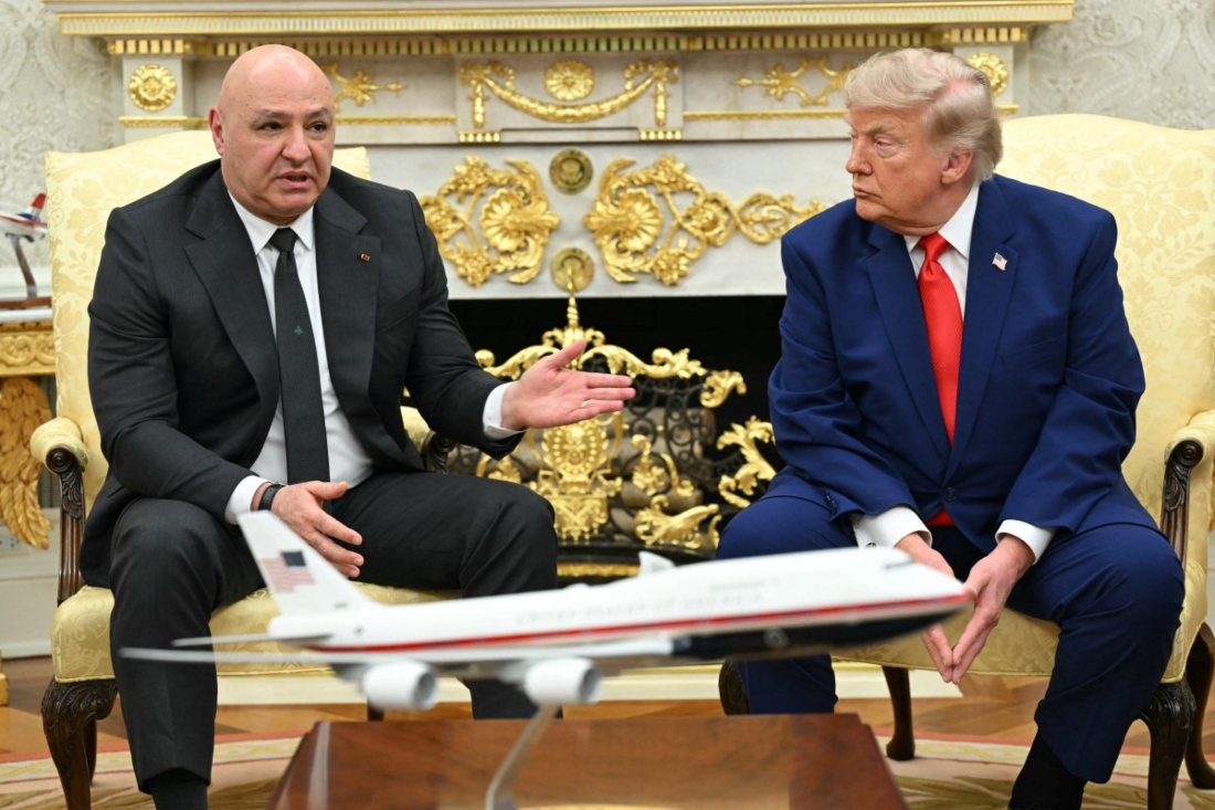 US President Donald Trump listens to Lebanese President Joseph Aoun during a meeting in the Oval Office of the White House in Washington, DC, on July 21, 2026. (AFP)