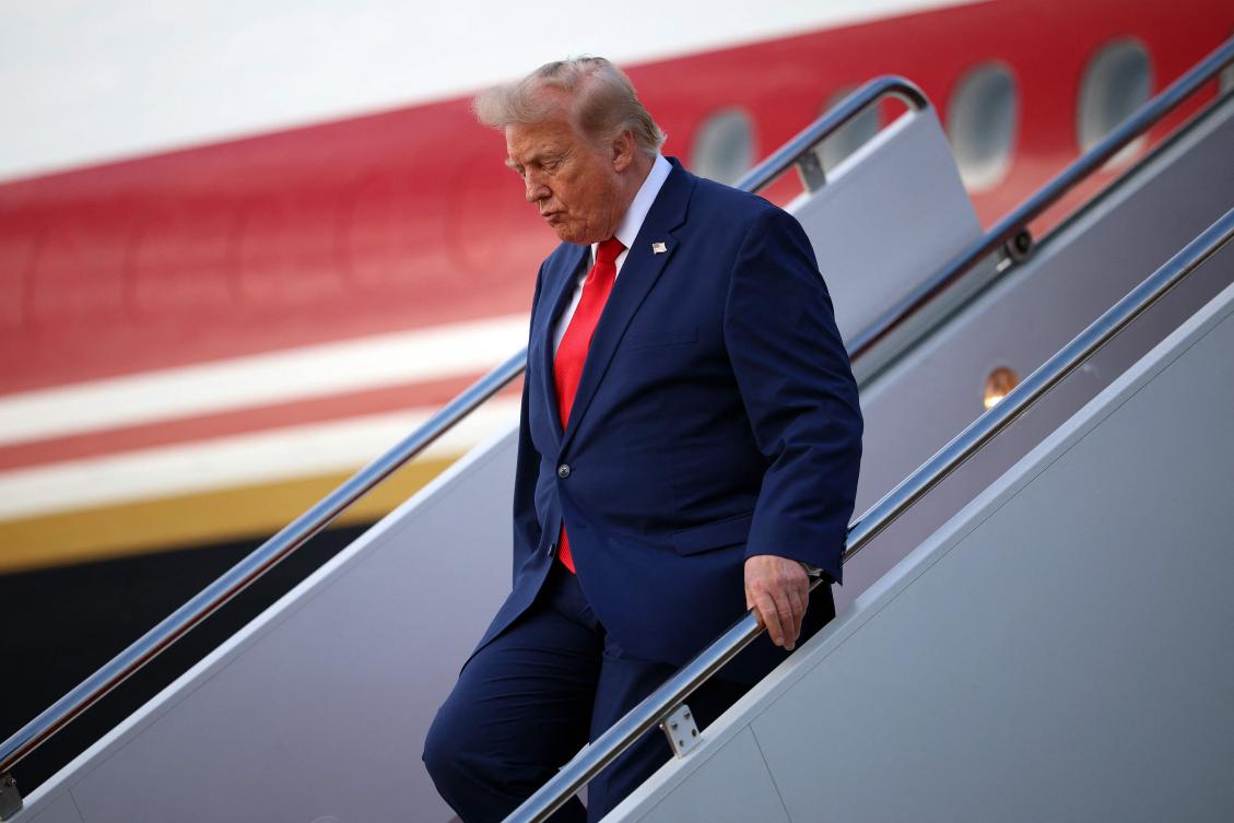 US President Donald Trump returning from attending a dignified transfer at Dover Air Force Base and a rally in Georgia. (File/AFP)