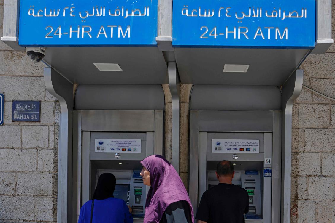 Israeli banks have informed their Palestinian counterparts that they intend to end critical banking services within weeks, Israeli and Palestinian officials said, raising fears of an economic crisis in the West Bank. (File/AFP)