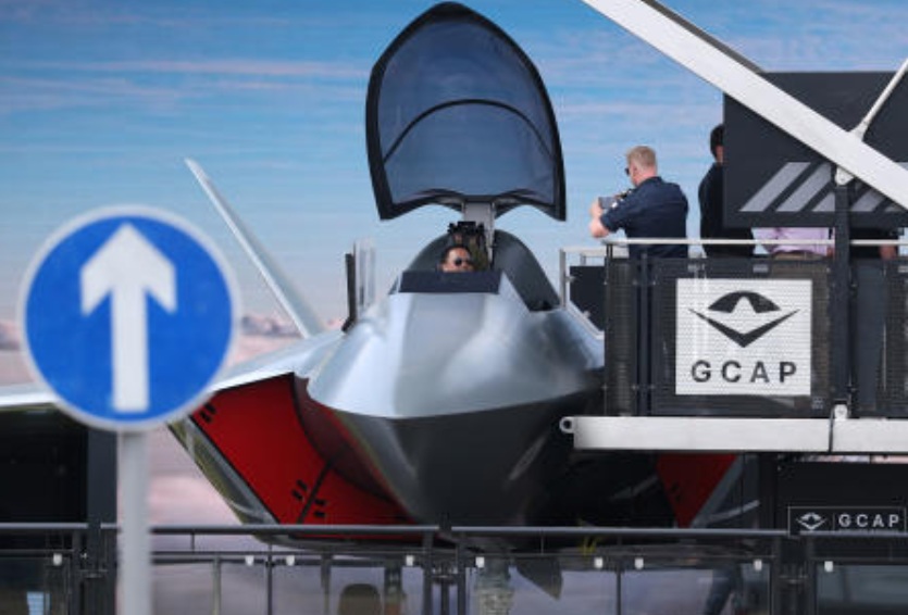 An attendee sits in the cockpit of a full scale mock-up of a Global Combat Air Programme Tempest fighter plane at the Farnborough International Airshow, in Farnborough, Britain, Jul. 23, 2026.( Reuters)