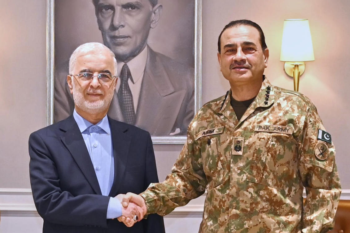 Iran's Interior Minister Eskandar Momeni, left, shakes hand with Pakistan's Army Chief Field Marshal Asim Munir prior to their meeting in Rawalpindi, Pakistan, on Tuesday. (Inter Services Public Relations via AP)