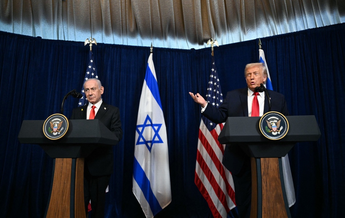 Israeli Prime Minister Benjamin Netanyahu looks on as US President Donald Trump speaks to journalists during a joint press conference at Trump’s Mar-a-Lago residence in Palm Beach, Florida, US. (AFP)
