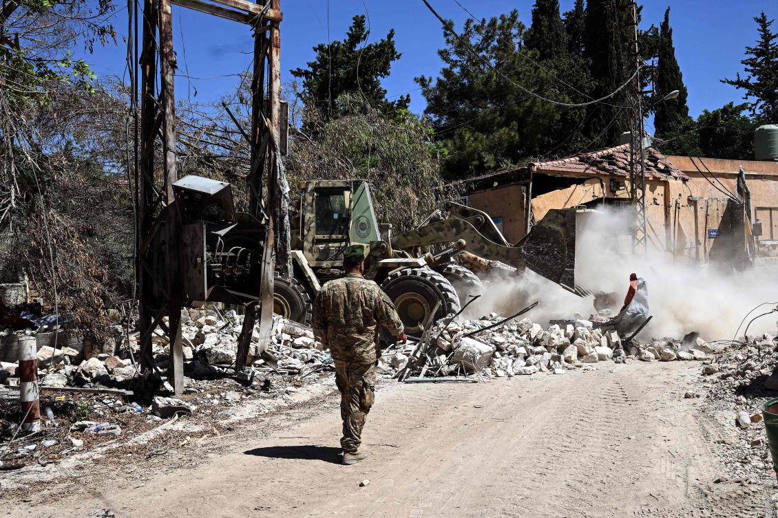 An army bulldozer clears rubble from a street in Zawtar Al-Gharbiya on July 28, 2026, after Lebanese forces deployed to the southern village as part of a framework deal reached with Israel. (AFP)