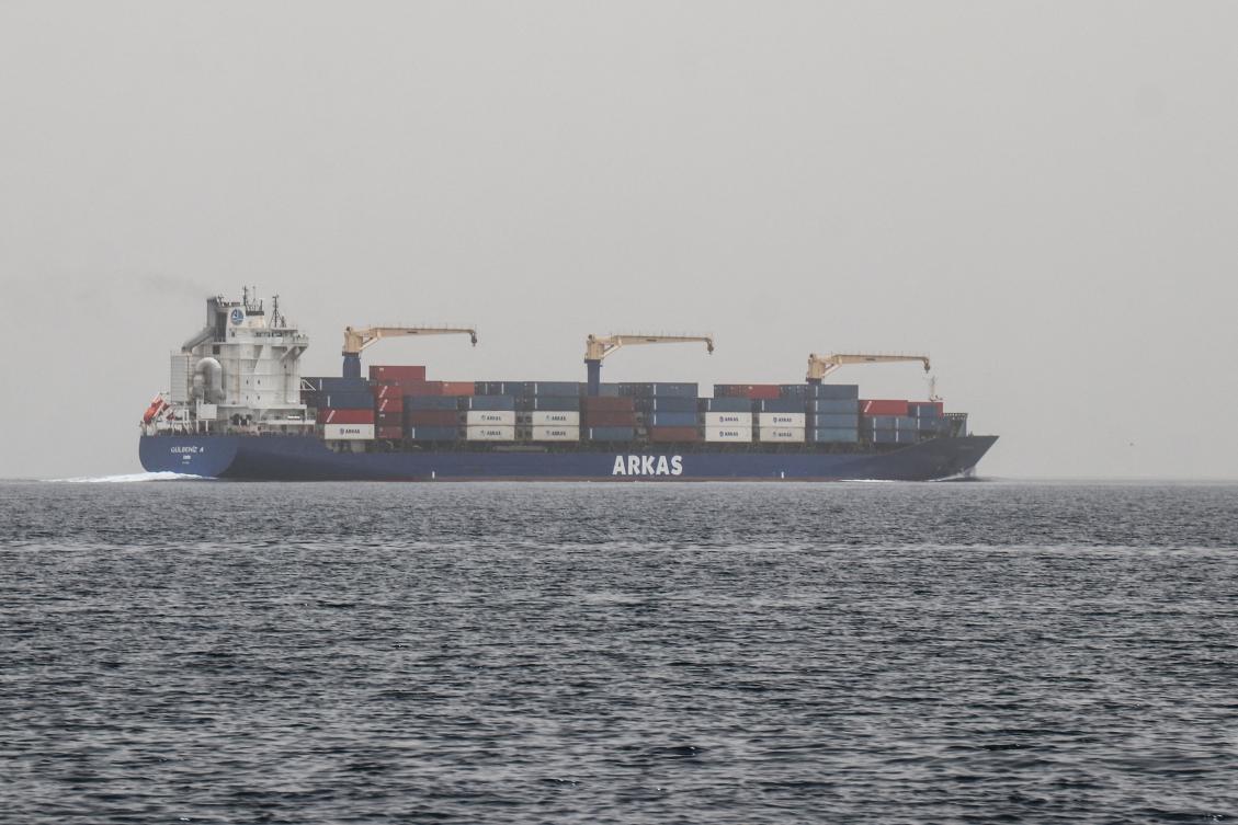 A commercial vessel passes through an international shipping lane off Yemen's Hanish Island in the Red Sea on July 27, 2026. (File/AFP)