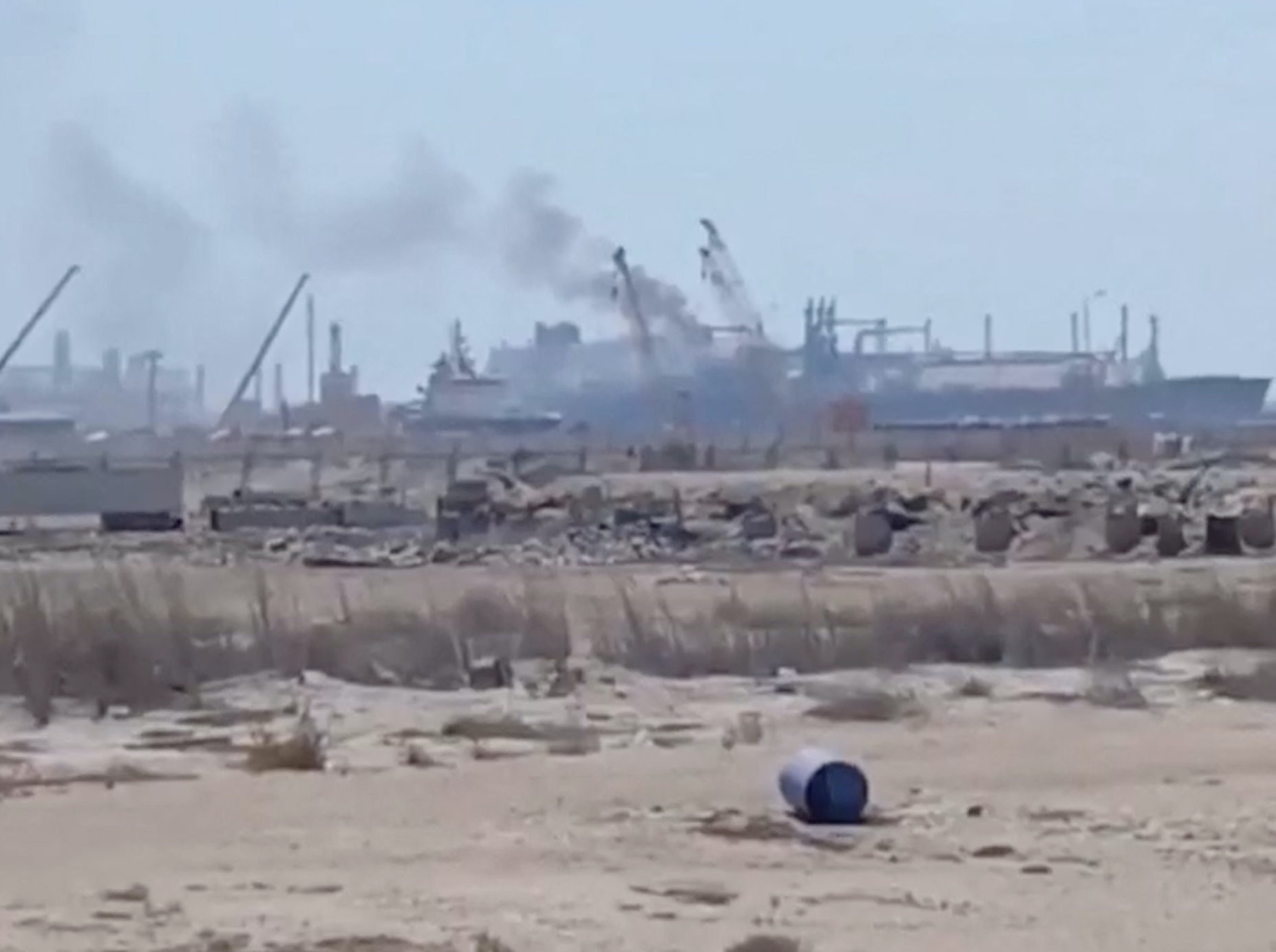 Smoke rises from a gas tanker after a drone strike, maritime security firm Ambrey said, at Damietta port, Egypt on Wednesday. (Social media/via Reuters)