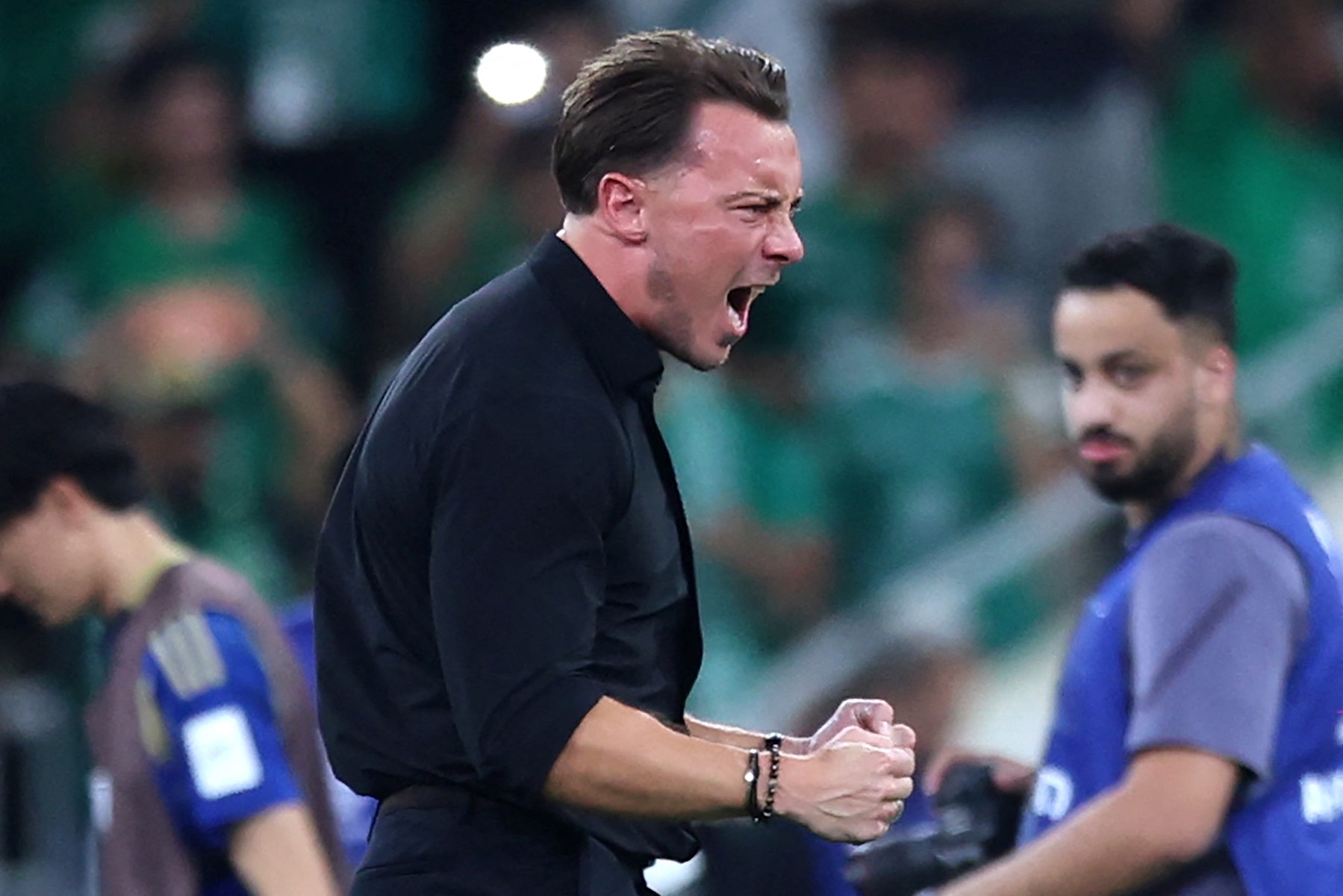 German coach Matthias Jaissle reacts as he celebrates with his team. (File/AFP)