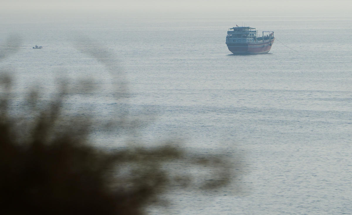 A vessel in the Strait of Hormuz, as seen from Musandam, Oman, July 31, 2026. (Reuters)