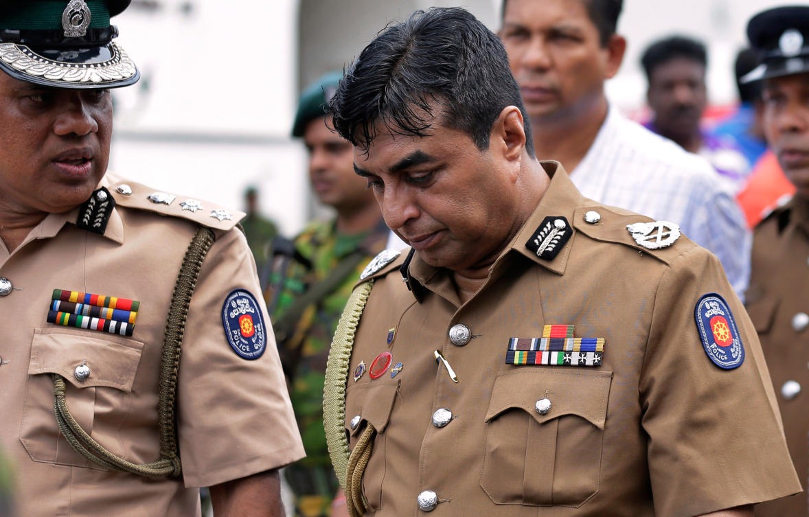 Former Sri Lankan police chief Pujith Jayasundara leaves after an inspection at St. Anthony's church that was targeted in the 2019 attacks. He has been found guilty of criminal negligence over the bombings. (AP/File)
