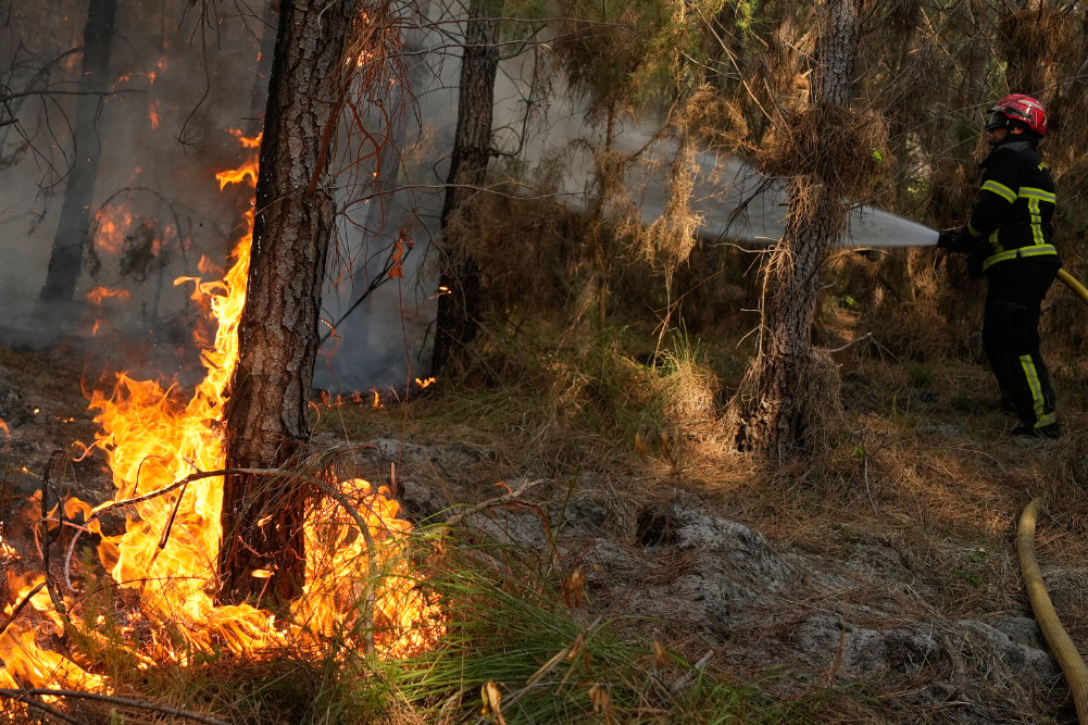 This spate of wildfires in Europe is happening as large parts of the continent have been hit by heatwaves. (AP)