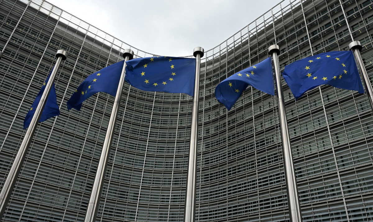 European Union flags in front of the Berlaymont building, the EU Commission headquarters, in Brussels. (AFP)