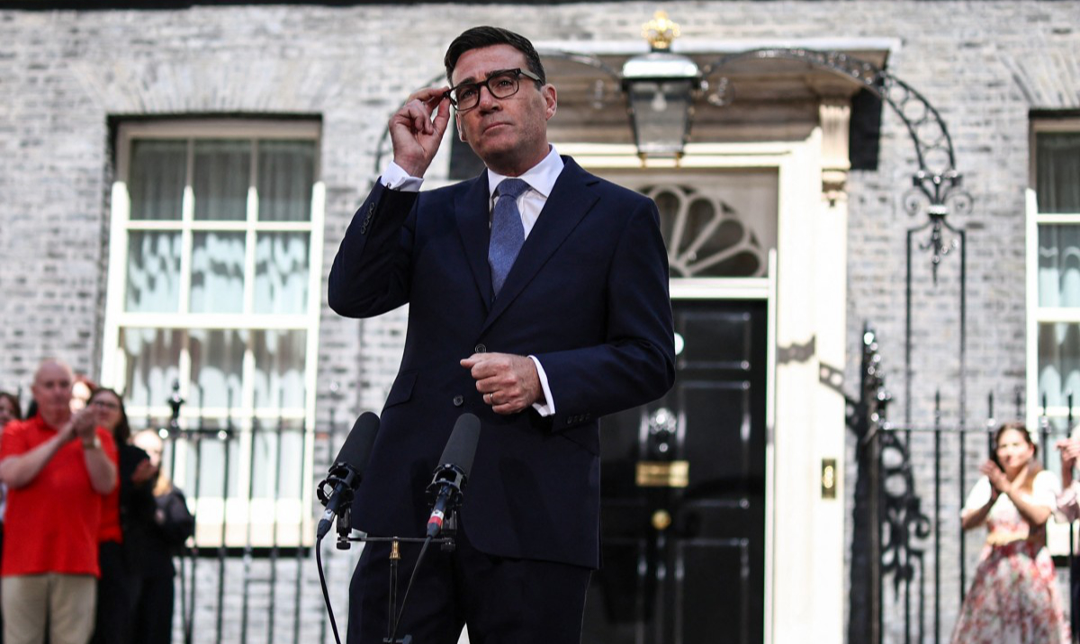 Britain's new Prime Minister Andy Burnham gives his first speech in front of 10 Downing Street. (AFP)