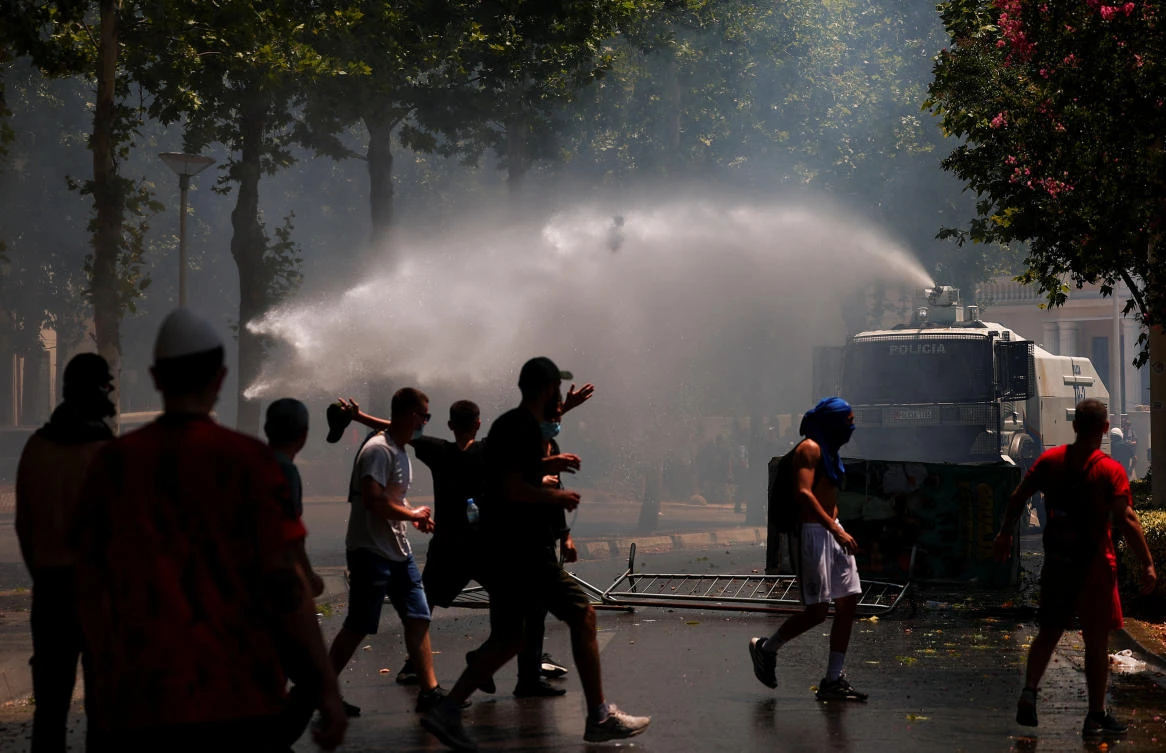 Albania police fire water cannon as Trump-linked protests boil over