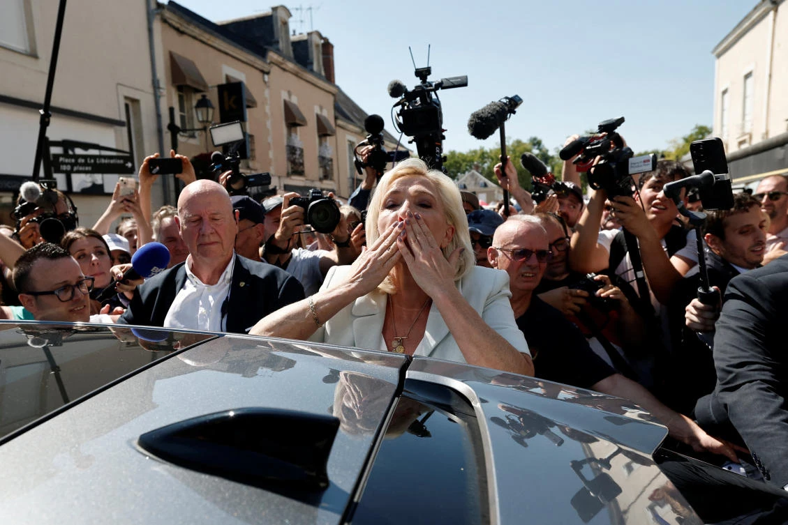 Le Pen hits campaign trail morning after announcing run
