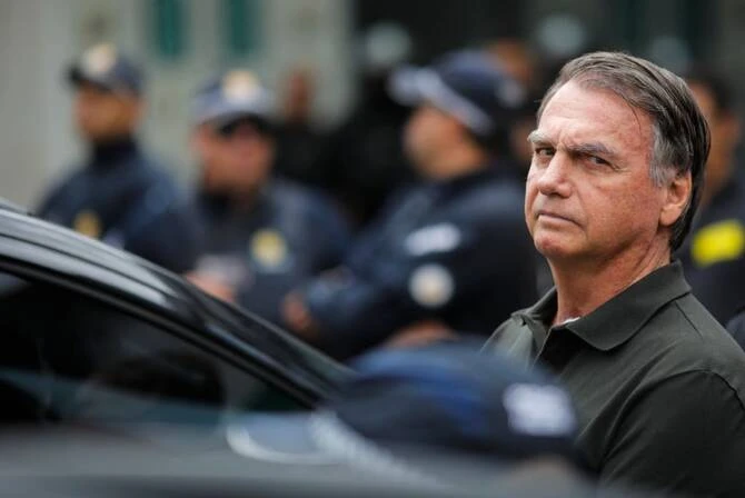 Brazilian police search former President Bolsonaro’s home for weapons, lawyer says