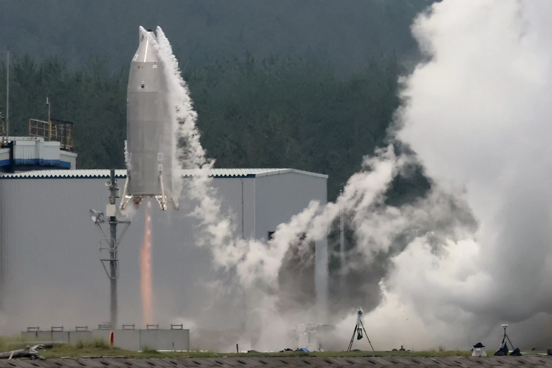 The Reusable Vehicle eXperiment, known as RV-X, is seen in a test launch at the Noshiro Rocket Testing Center of the Japan Aerospace Exploration Agency in Noshiro, northern Japan. (AFP)