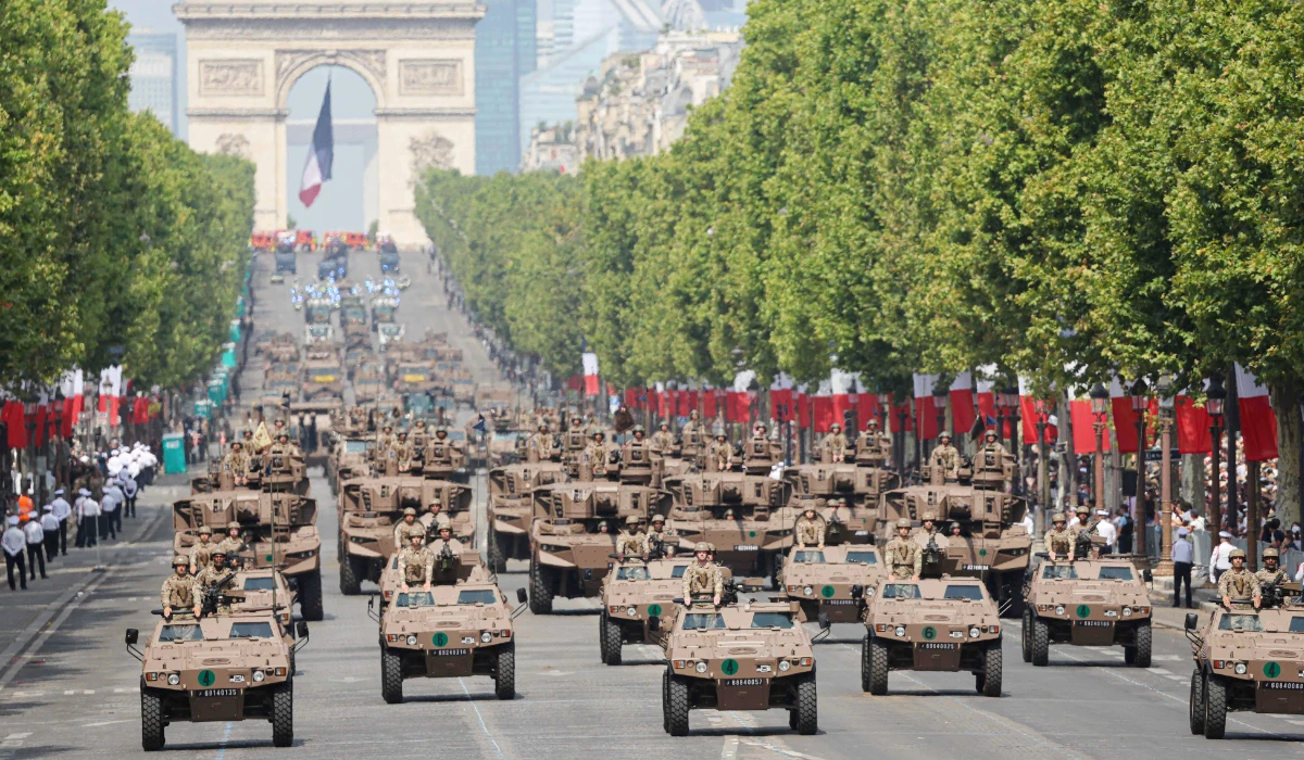 France's Armed Forces drive their motorised vehicles during the annual Bastille Day military parade on the Champs-Elysees Avenue in Paris on July 14, 2026. (AFP)