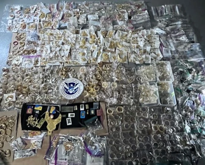 A photo of gold jewelry recently recovered by the new Trade and Custom Fraud Task Force displayed at an Illinois press conference, Tuesday, by the US Attorney Andrew Boutros. (Supplied)