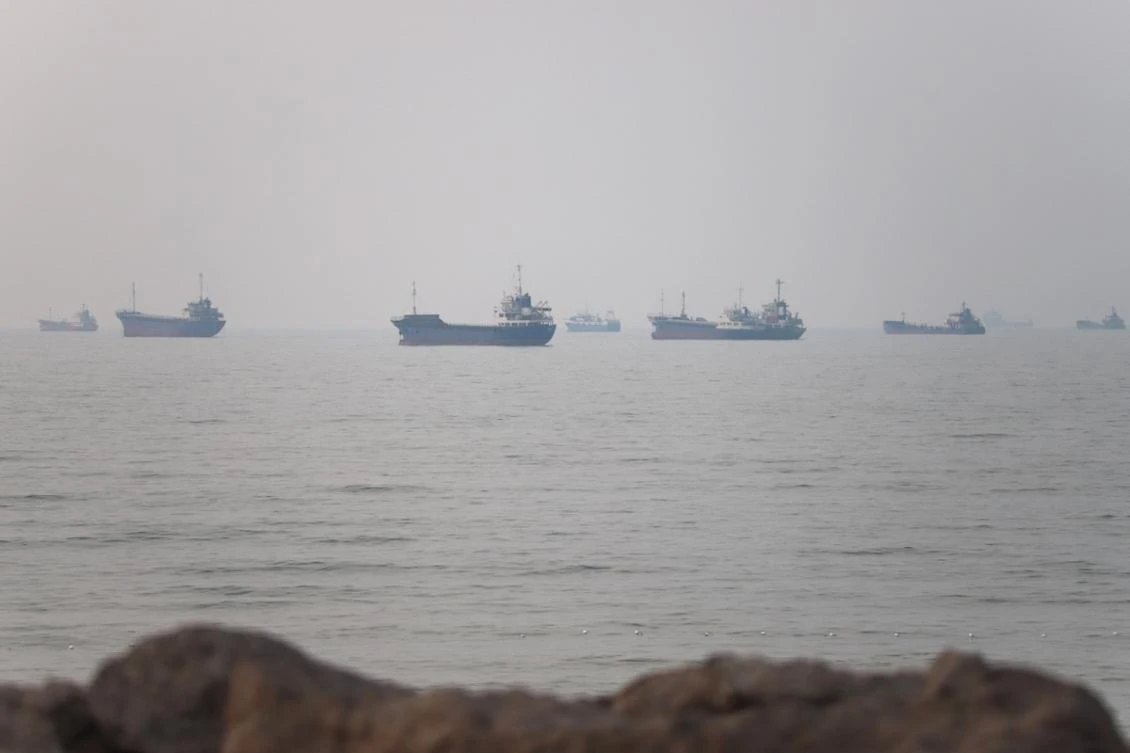 Above, vessels in the Strait of Hormuz near the beach of Bandar Abbas, Iran on June 30, 2026. (West Asia News Agency via Reuters)