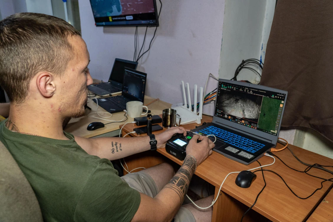 Above, a Ukrainian soldier of Khartia brigade controls a ground drone during a mission in Kharkiv region on July 25, 2026. (AP)