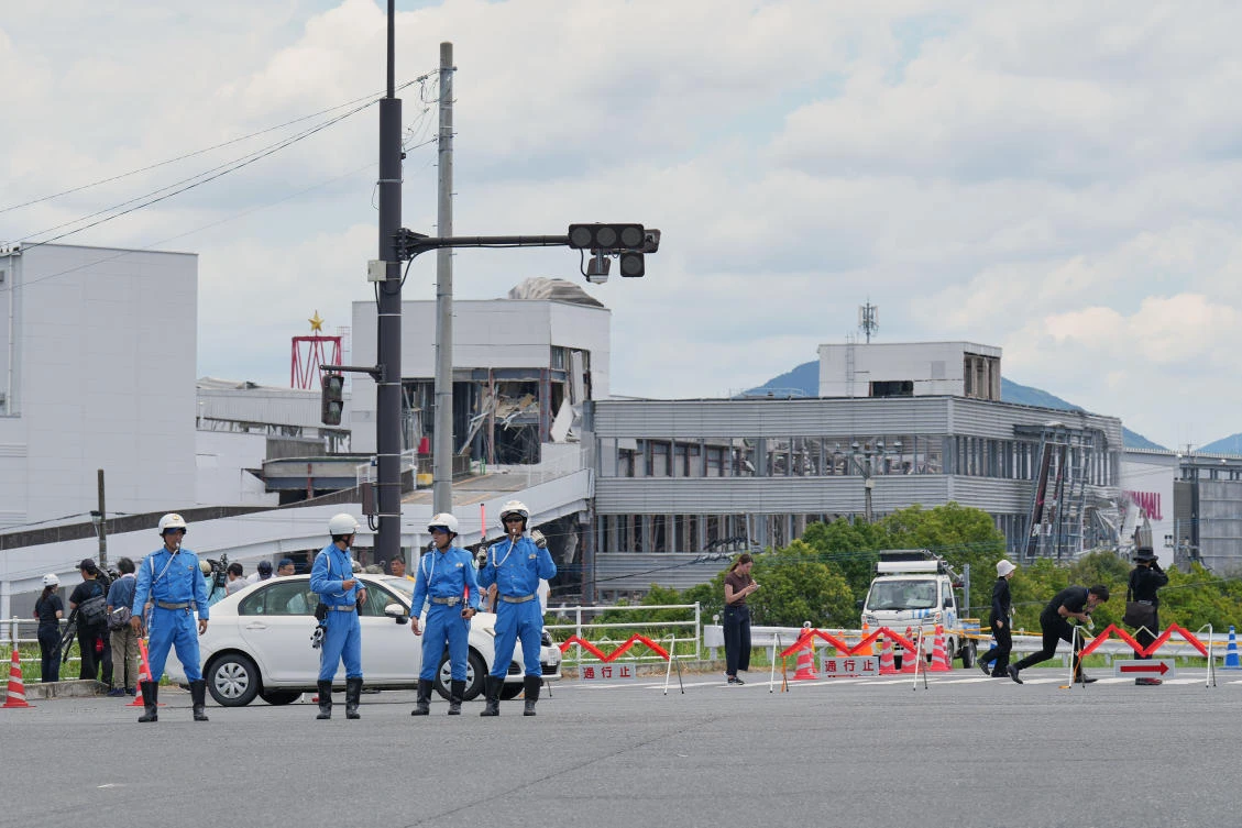 Rescuers haul survivors from wrecked Japan mall as earthquake toll hits 13